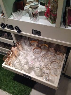 Loads of fantastic mid century modern cut  crystal and hand painted bar ware .  High balls , low balls , water and wine glasses .