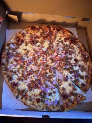 Large cheese pizza with sausage, prosciutto & red onion