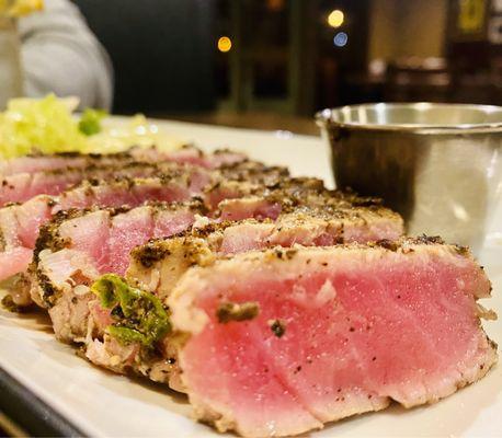 Perfectly seared Tuna Tartar with a wasabi cream sauce & salad in gingery soy dressing.  Our fave we get it every time :)...