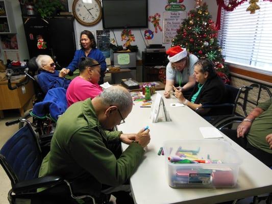 Seniors enjoying themselves during our holiday community service event