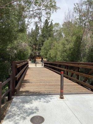 Bridge leads to the parking lot.