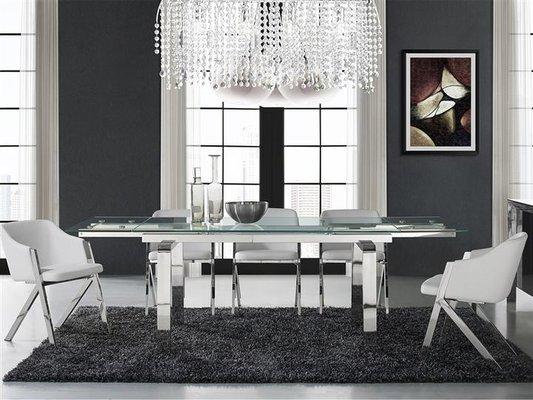 Extendable Glass Dining table available at By Design Contemporary Furniture, Arlington.