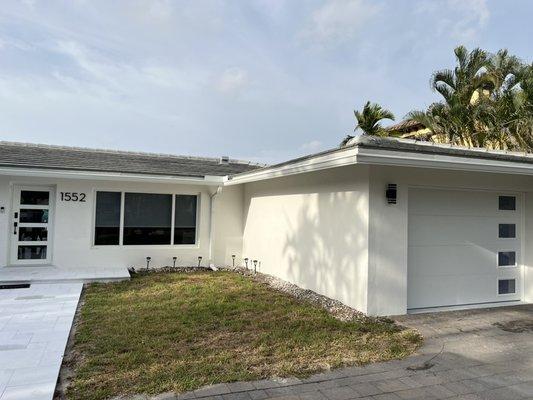 Impact windows and modern garage door