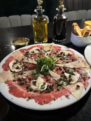 Beef carpaccio (a bit too much cheese and in need of some type of vinaigrette)