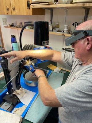 Bob, one of the owners, working on a customer's order.