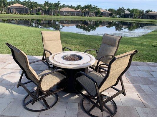 Swivel rocker chairs and fire table.