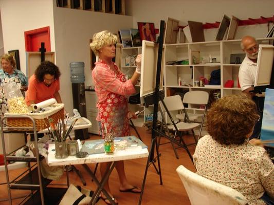 Students enjoying a small group Painting class