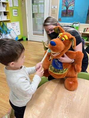 Visits with local preschools during National Children's Dental month to demonstrate proper teeth brushing.