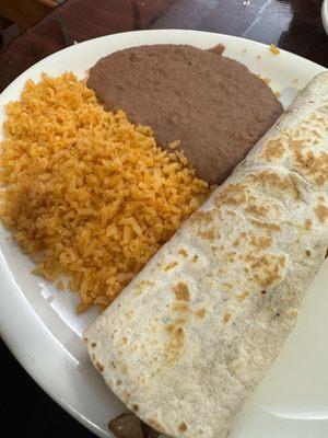 Steak burrito with rice and beans on the side. Very good.