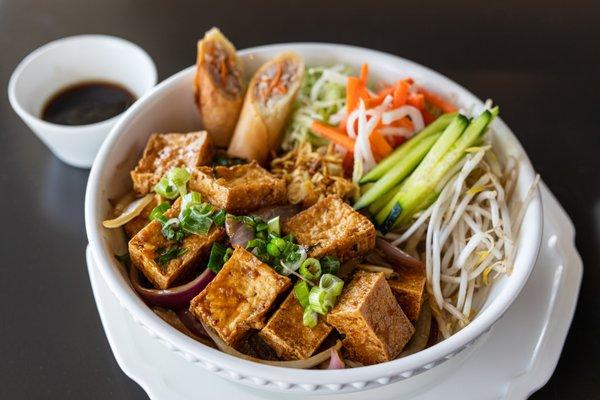 Stir Fried Tofu Vermicelli Bowl - fresh lettuce, mint, basil, cucumber, pickled daikon and carrots, bean sprouts, and roasted peanuts