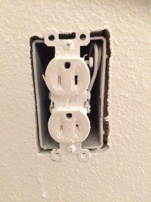 This is after their painter touched up the outlet at my request