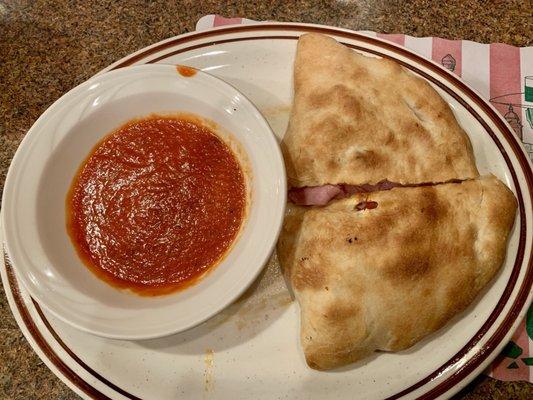 Small Stromboli. Lots of dough. Sauce is bland.