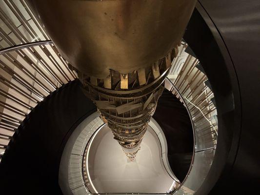 3rd Floor spiral staircase and beautiful three-story art piece.