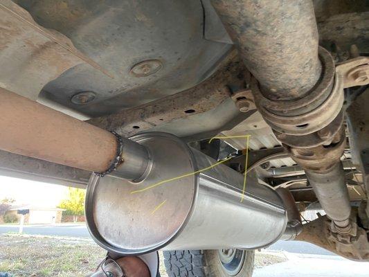 Where the muffler is supposed to go.