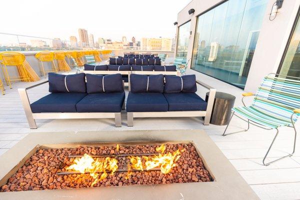 Outdoor seating with a firepit.