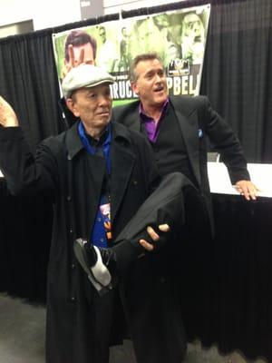 James Hong posing for pics with Bruce Campbell