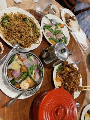 Left to right, vegetable lo mien, seafood tofu hotpot, sweet and sour pork chops and fish with snap peas