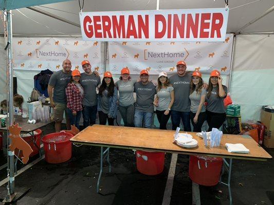 The NextHome Luxe Group family volunteering at this years OktoberFest in Montrose.