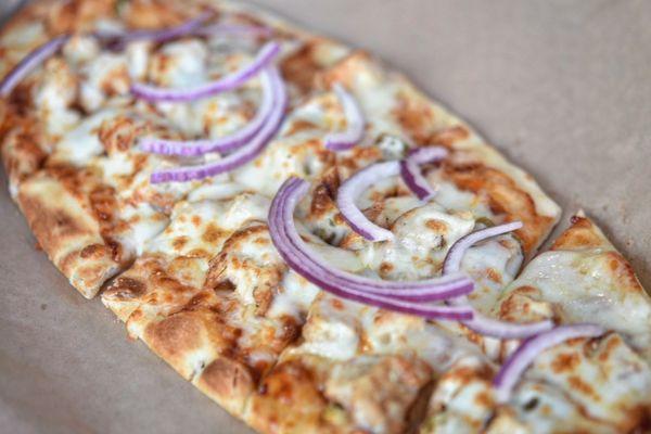 Little bit of sweet balanced with a little but of heat. Mozzarella, red onion, jalapeño, BBQ sauce, chicken, and hot honey.