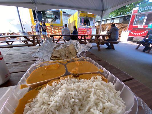 Chicken Tokka Chicken Tikka Masala with Dhaba food cart in the background