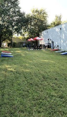 Cornhole and horseshoes are available to play in the side yard with outdoor seatings.