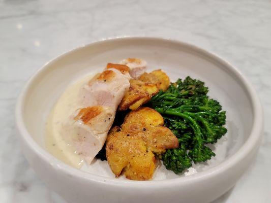 Chicken 
Fingerling potatoes,  brocolini, onion cream