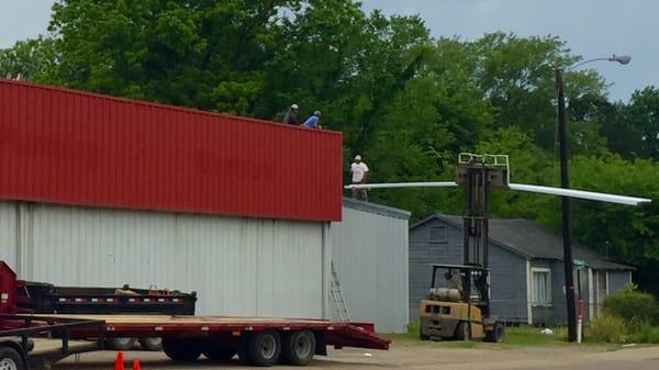 Our professional crew is working on a partial roof replacement today at Phillips Lumber.