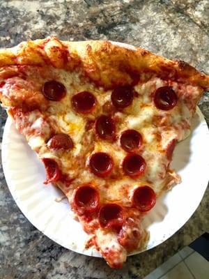 Delicious slice of pepperoni pizza. They offer both kinds of pepperoni too.