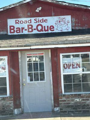 Front door and sign.