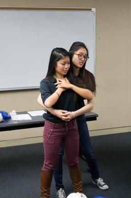 Instructors Parra and Kristin demonstrating proper J-thrust maneuver