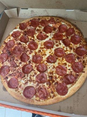 Uncut pepperoni pizza.