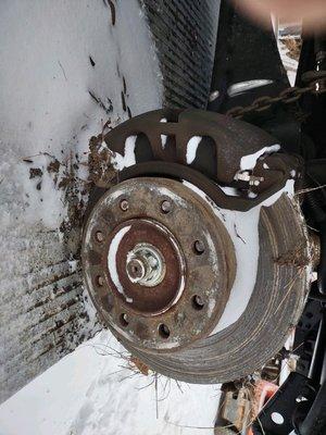 Snapped wheel studs, and yeah that's how the rotors looked with fairly new pads "slapped" on her...