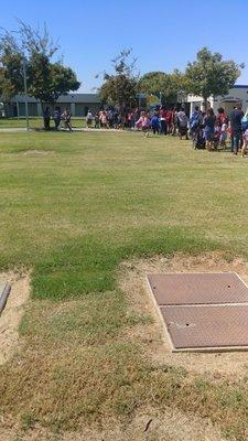 Long line for some yummy shaved ice after school-  they take cash n cc