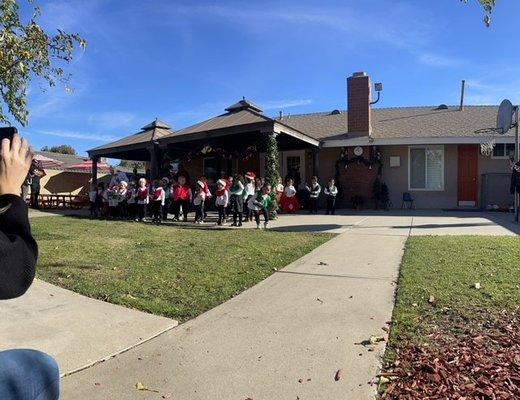 They sang a variety of holiday and Christmas songs using percussion sleigh bells. So cute!