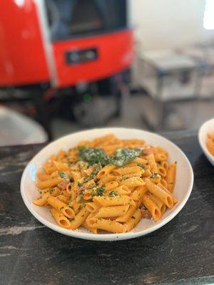 A delicious Penne alla Vodka. A creamy tomato sauce with pancetta.