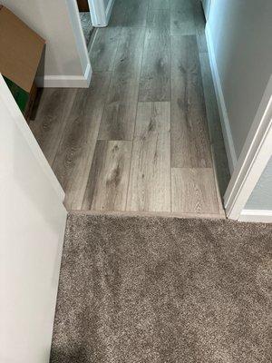 Carpet and premium vinyl flooring.