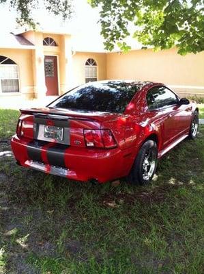 2000 Mustang GT Shown after complete paint job. Painted using DuPont Chromabase Vermillion Red with "pearl" painted Lemans Strip