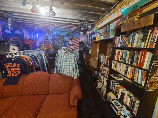 Downstairs books clothes and the stage