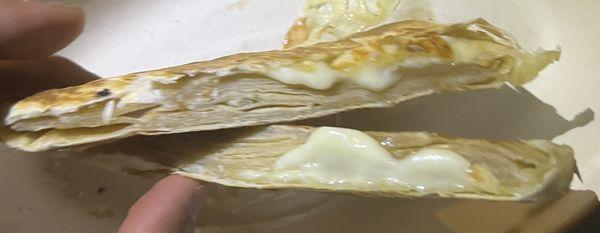 Look at the layer of Tortillas vs cheese for a so called Cheese Quesadilla.