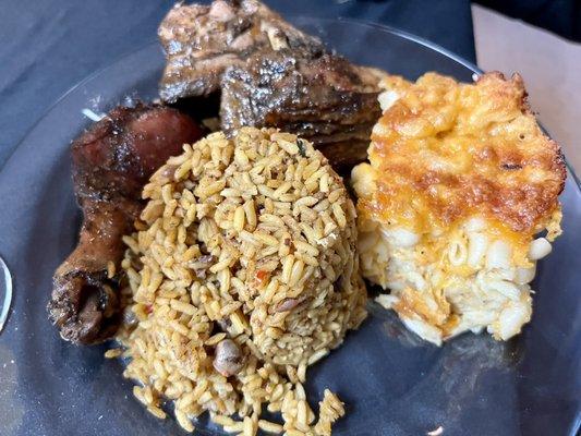 Jerk Chicken, Rice and Peas, Mac and Cheese ($15)