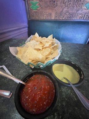 Chips & salsas. Red is very  flavor influenced. Green is was also good. Served room temp/cool.