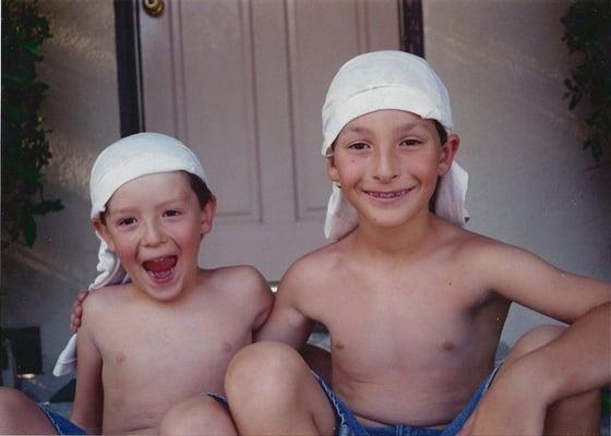 A pair of Tom Sawyer adventurers modeling one of the classic styles at camp- adventuring is serious business!