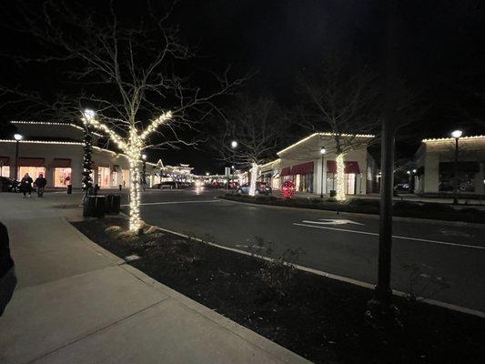 Strolling down the sidewalk listening to music & enjoying the Christmas lights