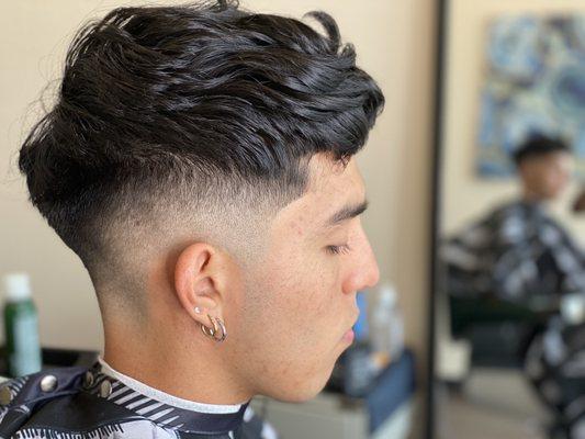 Medium bald fade cut by Kisa