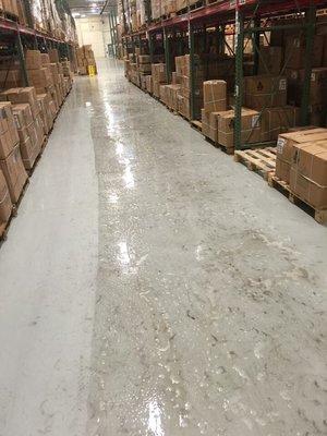 Scrubbing large warehouse floor