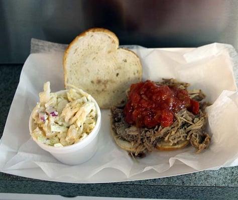 Pulled Pork on Pretzel Bun w/ Pineapple Slaw