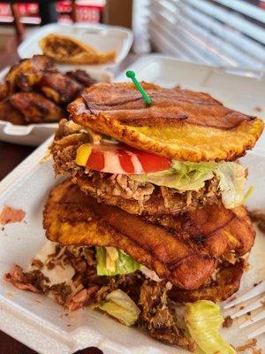 Tripleta, plantain sandwich with three meats, ham, roast pork, and steak ($9.50)