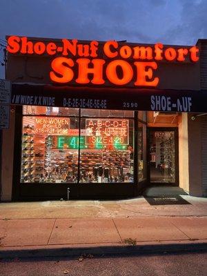 Please upload this photo as my profile photo right way  To see the store light sign with shoe- nuf comfort shoe name upgrade properly