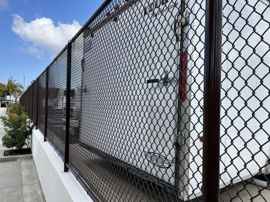 Brown vinyl special mesh chain link fence