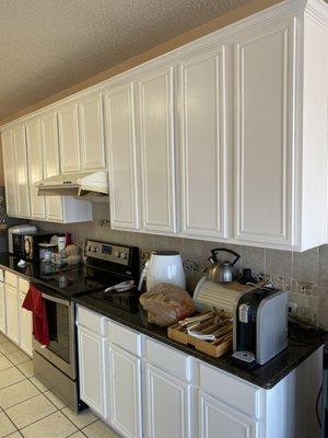 Cabinets repaired and painted